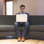 Man, laptop, businessman — A few benefits of using a digital business card