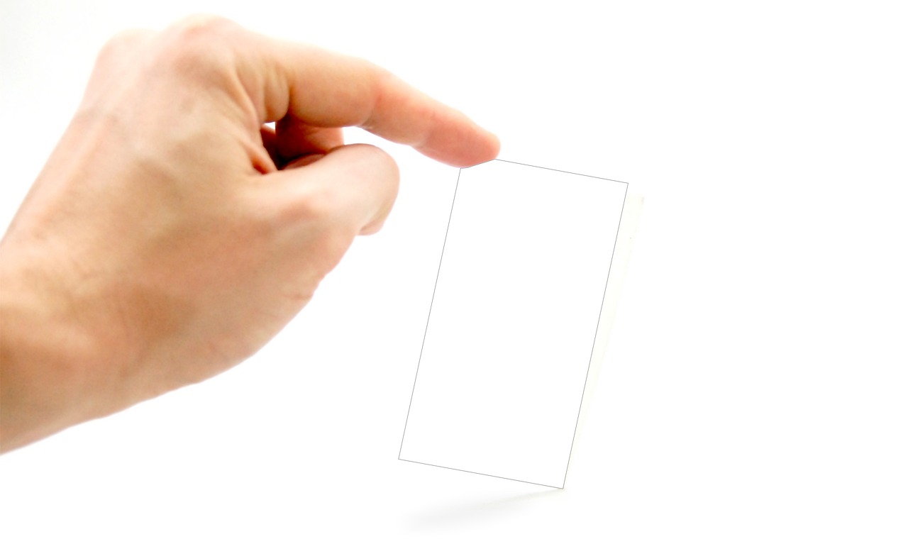 Business card, business, hand — Benefits Of Using Money Lending Apps And Their Importance