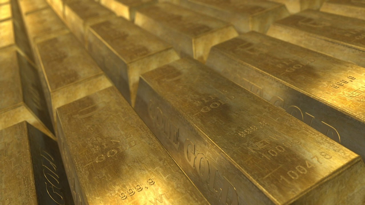 Gold, bars, wealth — Consult experts before investing in cryptocurrency to gain high profits