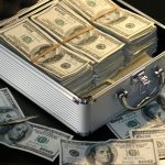 Dollar, money, case — How to trade in stock market beginners