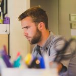 Man, work, desk — How to Use LinkedIn Like a Business Professional