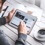 Man, reading, touchscreen — Karaoke Hosting Jobs: Fun, Flexible, and Perfect for Part-Time