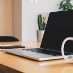 Office, desk, coffee cup — Make money from music: Best Possible Practices for Spotify Promotion