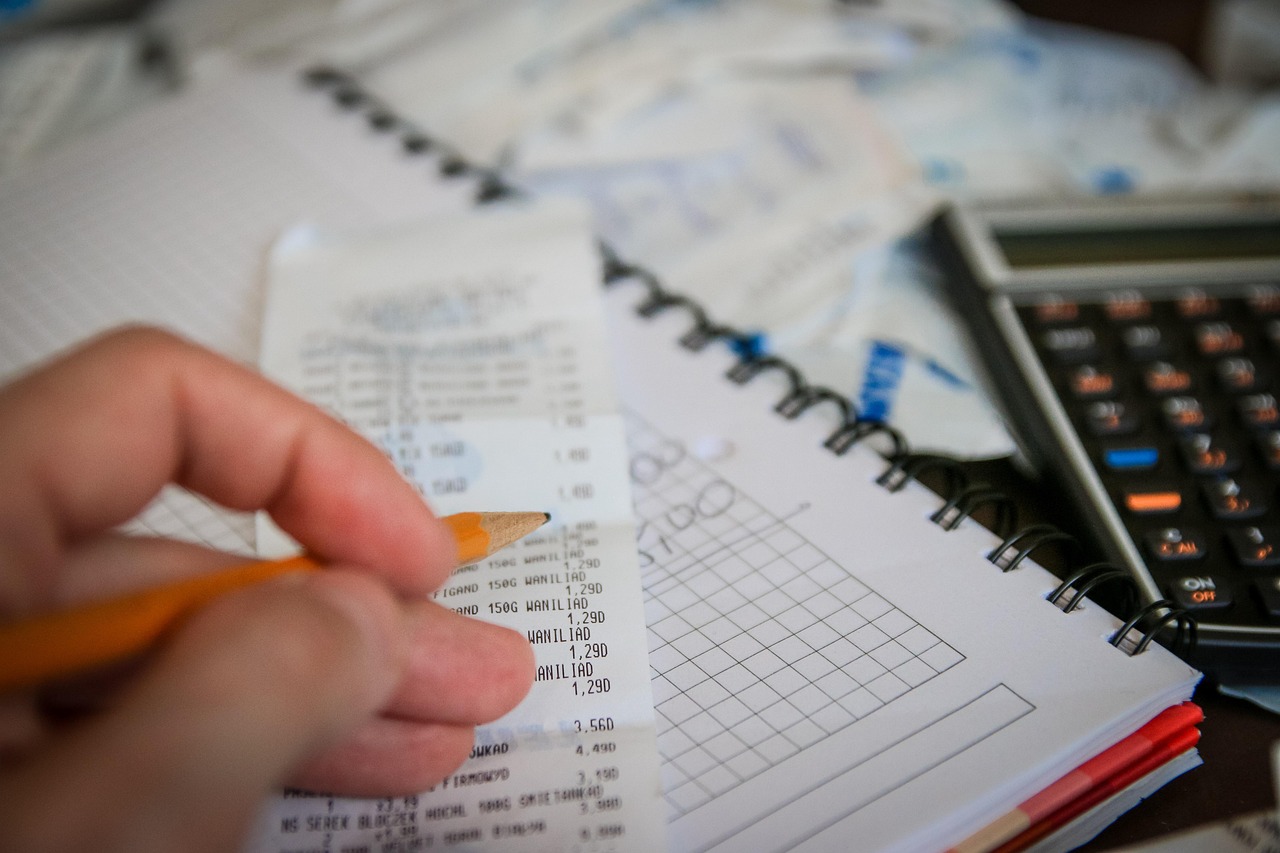 Money, bills, calculator — Shopping At a Furniture Thrift Store