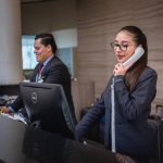 Receptionists, phone call, hotel — Tips While Selecting A Good Ergonomic Office Chair