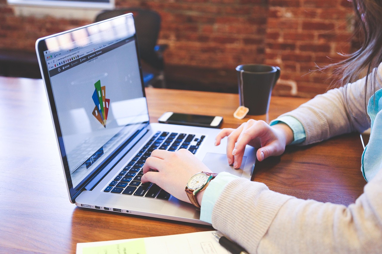 Student, typing, keyboard — Top Benefits of Custom Trade Show Displays