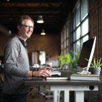 Office desk, man, business — Why magneto development is preferred