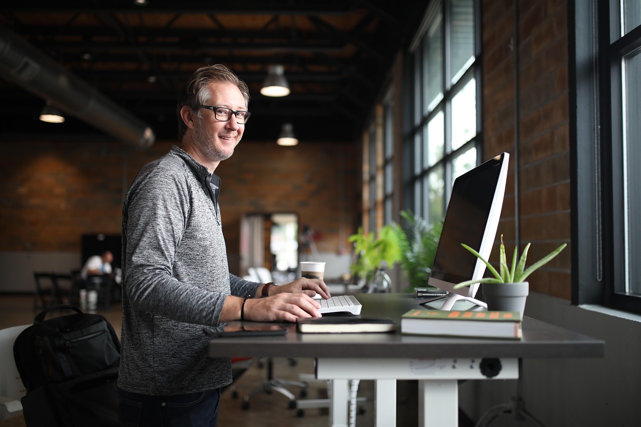 Office desk, man, business — Why magneto development is preferred