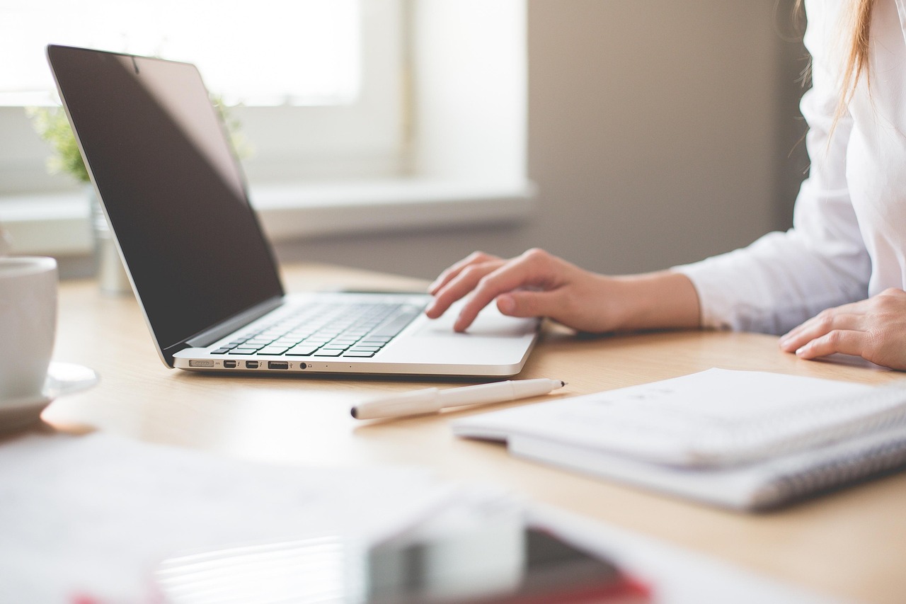 Notebook, work, girl — Why Should You Hire an Audit Company in Malaysia?